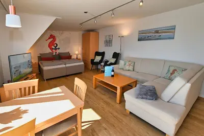 Ein Sitzbereich in der Unterkunft Ferienwohnung NORDIA Allee und See
