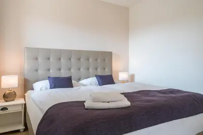 Ein Bett oder Betten in einem Zimmer der Unterkunft Diekhuus Büsum