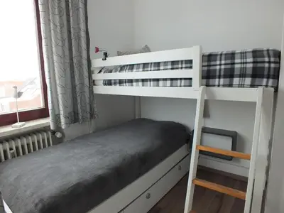 Ein Bett oder Betten in einem Zimmer der Unterkunft Watten-Blick 1