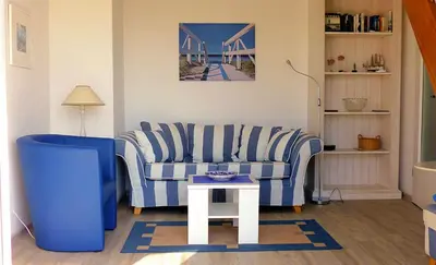 Ein Sitzbereich in der Unterkunft Ferienwohnung Meisennest