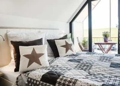 Ein Bett oder Betten in einem Zimmer der Unterkunft Perlekieker 2