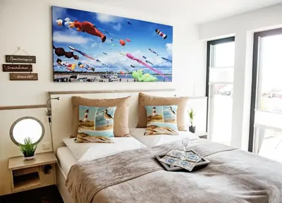 Ein Bett oder Betten in einem Zimmer der Unterkunft Perlekieker 1
