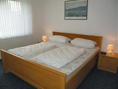 Ein Bett oder Betten in einem Zimmer der Unterkunft Maike 5a