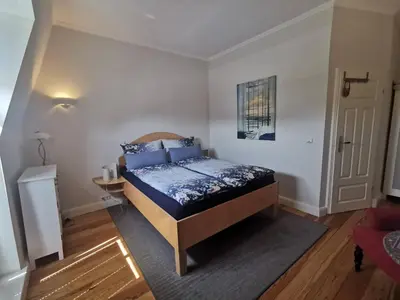 Ein Bett oder Betten in einem Zimmer der Unterkunft Haus Deichvoigt