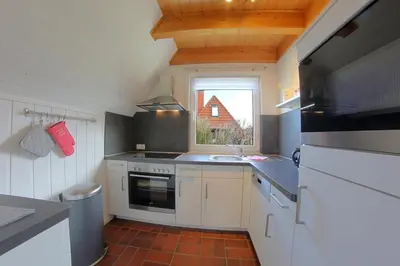 Küche/Küchenzeile in der Unterkunft Ferienhaus Vogel - Dorum Neufeld - Nordsee