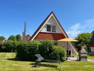 Ein Garten an der Unterkunft Ferienhaus Vogel - Dorum Neufeld - Nordsee