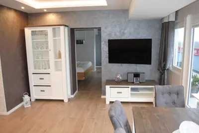 TV/Unterhaltungsangebot in der Unterkunft Terrassenhaus Penthouse-Wohnung 93
