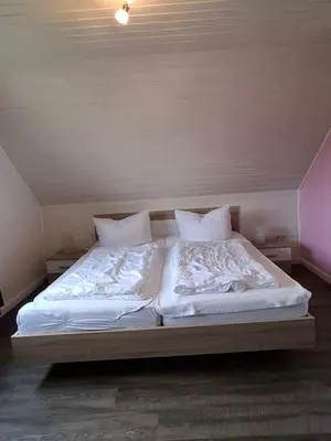 Ein Bett oder Betten in einem Zimmer der Unterkunft Ferienhaus Sander
