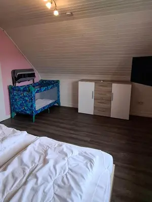 Ein Bett oder Betten in einem Zimmer der Unterkunft Ferienhaus Sander