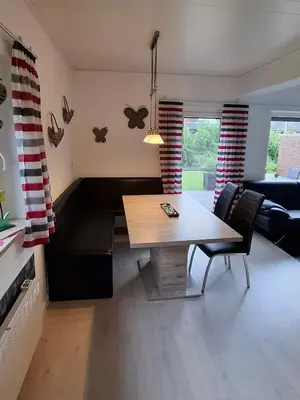 Ein Sitzbereich in der Unterkunft Ferienhaus Sander