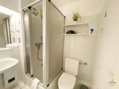 Ein Badezimmer in der Unterkunft Urlaub mit Blick auf den Duhner Strand