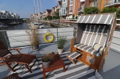 Ein Balkon oder eine Terrasse in der Unterkunft Havenkoje