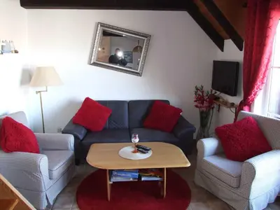 Ein Sitzbereich in der Unterkunft Ferienwohnung Baade -KEINE MONTEURE-