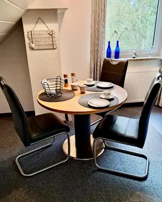 Ein Sitzbereich in der Unterkunft Ferienwohnung Butendiek