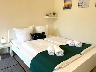 Ein Bett oder Betten in einem Zimmer der Unterkunft Frauenpreiss Whg. 56