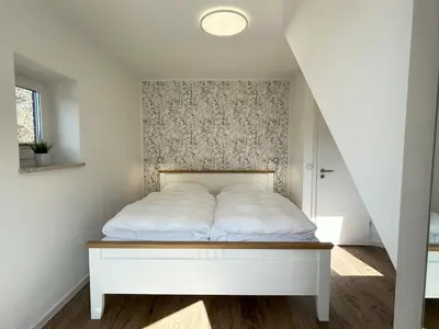 Ein Bett oder Betten in einem Zimmer der Unterkunft Padua W05