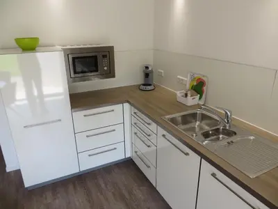 Küche/Küchenzeile in der Unterkunft dat geele hus Wohnung 6