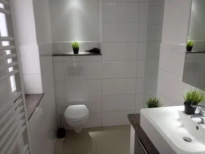 Ein Badezimmer in der Unterkunft dat geele hus Wohnung Nr. 4