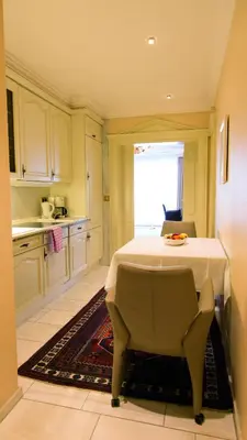Küche/Küchenzeile in der Unterkunft Seeschlößchen - Hotel Strandperle