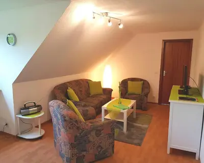 Ein Sitzbereich in der Unterkunft Ferienwohnung Nordwind