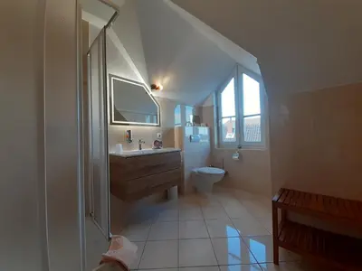 Ein Badezimmer in der Unterkunft Ferienwohnungen Auf der Düne