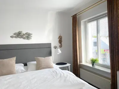 Ein Bett oder Betten in einem Zimmer der Unterkunft Westerstrasse 6