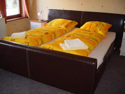 Ein Bett oder Betten in einem Zimmer der Unterkunft Die Lütte Krabbe