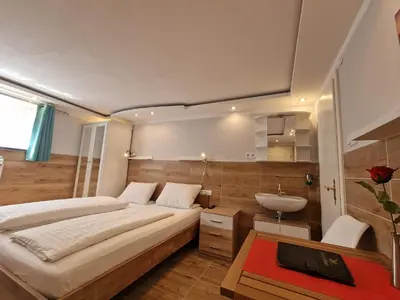 Ein Bett oder Betten in einem Zimmer der Unterkunft Hotel Kenny & Henry