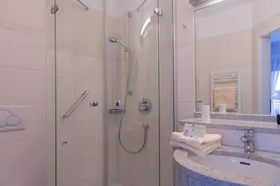 Ein Badezimmer in der Unterkunft Hotel Christiansen