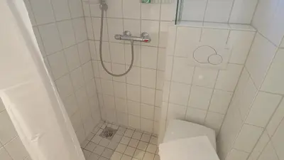 Ein Badezimmer in der Unterkunft Westerstrasse Kajüten