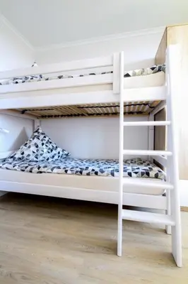 Ein Bett oder Betten in einem Zimmer der Unterkunft Knechtsand 433