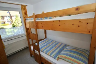 Ein Bett oder Betten in einem Zimmer der Unterkunft Medemufer