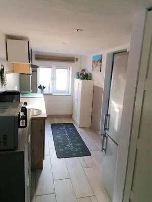 Küche/Küchenzeile in der Unterkunft Ferienhaus Mia, Urlaub mit Hund, eingezäunter Garten, Friedrichskoog-Spitze