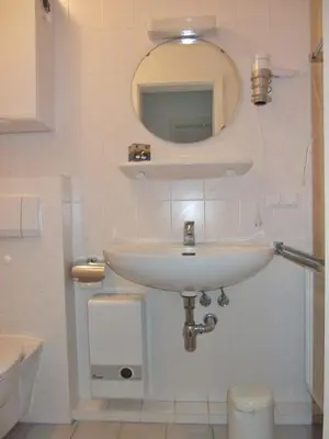 Ein Badezimmer in der Unterkunft Robbenplate 19