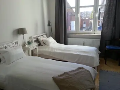 Ein Bett oder Betten in einem Zimmer der Unterkunft Haus MeerZeit