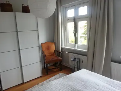Ein Bett oder Betten in einem Zimmer der Unterkunft Haus MeerZeit