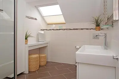 Ein Badezimmer in der Unterkunft Strandläufer