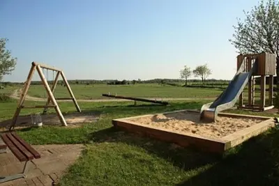 Ein Kinderspielbereich in der Unterkunft Vogelsand 321