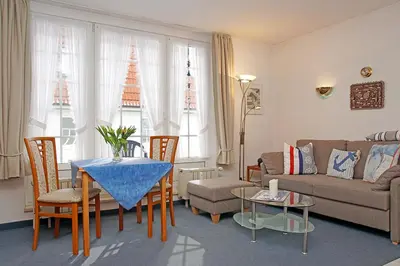 Ein Sitzbereich in der Unterkunft Fischerhus - Wohnung 5