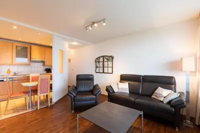 Ein Sitzbereich in der Unterkunft Pacific Wohnung 41