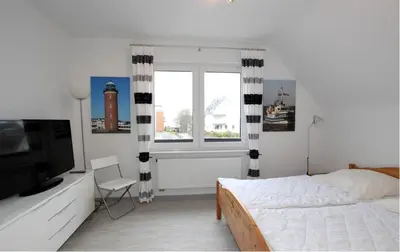 Ein Bett oder Betten in einem Zimmer der Unterkunft Neuwerk