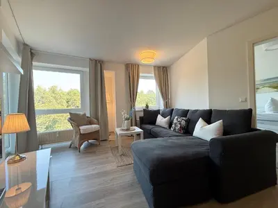 Ein Sitzbereich in der Unterkunft Ferienwohnung Nordseebrandung A3.3