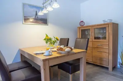 Ein Sitzbereich in der Unterkunft Ferienwohnung Nordseebrandung B4.1