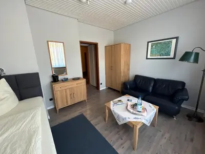Ein Sitzbereich in der Unterkunft Hotel-Restaurant Nord Stuv