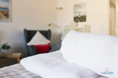 Ein Bett oder Betten in einem Zimmer der Unterkunft Urlaub direkt im Hafen