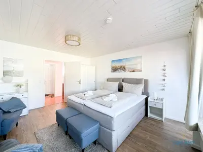 Ein Bett oder Betten in einem Zimmer der Unterkunft Urlaub direkt im Hafen