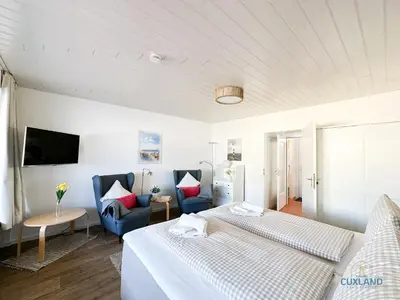Ein Bett oder Betten in einem Zimmer der Unterkunft Urlaub direkt im Hafen