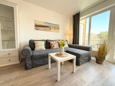 Ein Sitzbereich in der Unterkunft Ferienwohnung Nordseebrandung A1.4
