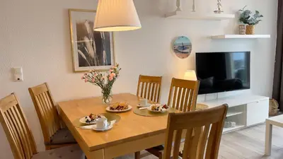 Ein Sitzbereich in der Unterkunft Ferienwohnung Nordseebrandung A1.4