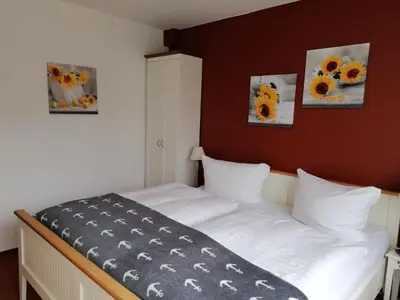 Ein Bett oder Betten in einem Zimmer der Unterkunft Hotel Möven-Kieker